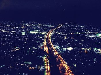 Aerial view of illuminated cityscape