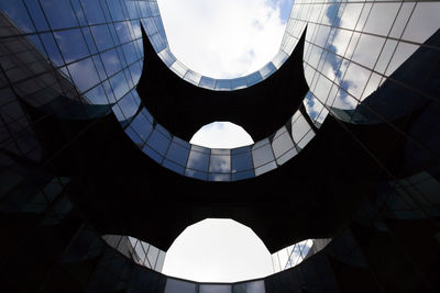 Low angle view of modern building against sky