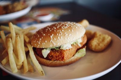 Close-up of burger in plate on table