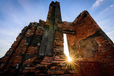 Low angle view of old building against sky