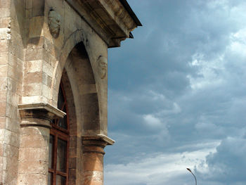 Low angle view of old building against sky