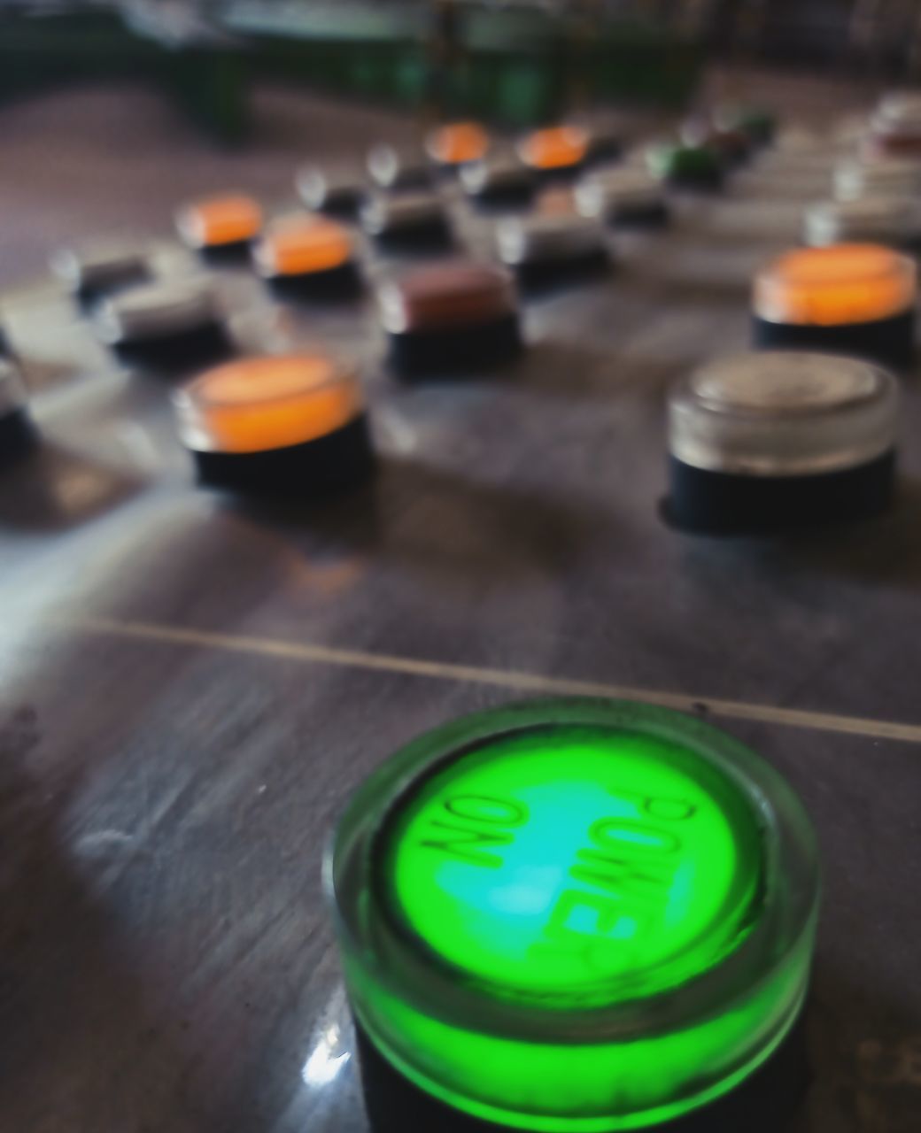 HIGH ANGLE VIEW OF ILLUMINATED LIGHT CANDLES ON TABLE