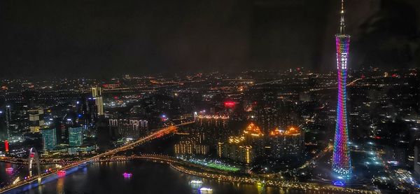 Illuminated buildings in city at night