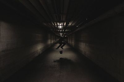 Full length of woman in tunnel