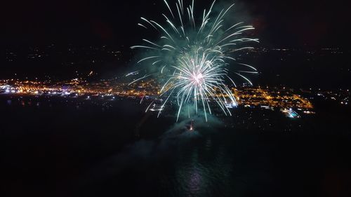 Firework display at night