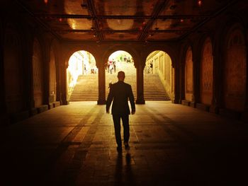 People walking in tunnel