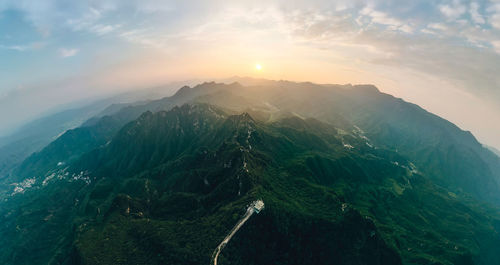 Scenic view of mountains against sky during sunset