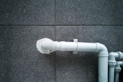 Close-up of pipe on wall