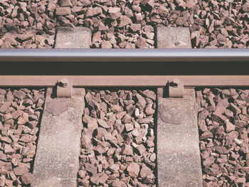 High angle view of stones on railroad track