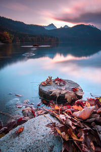 Scenic view of lake against sky during sunset