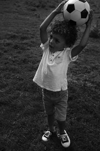 Boy holding football