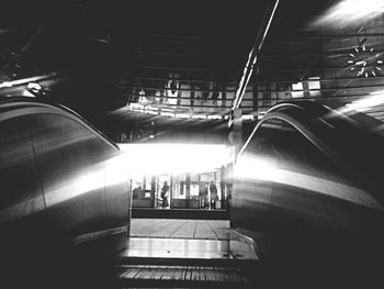 Low angle view of illuminated escalator