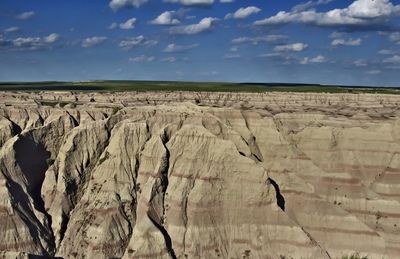 Scenic view of rock formations against sky