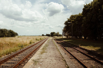 Railroad track against sky