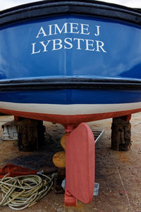 Close-up of information sign on boat