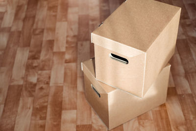 High angle view of box on hardwood floor