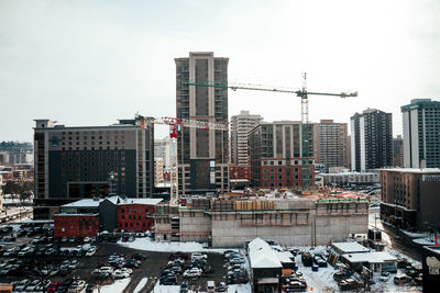 Modern buildings against sky in city