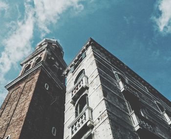 Low angle view of old building against sky