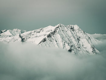 Snow covered mountain against sky