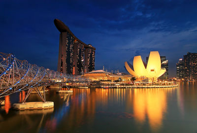 Illuminated buildings in city at night