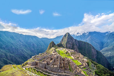 Scenic view of machu picchu against blue sky