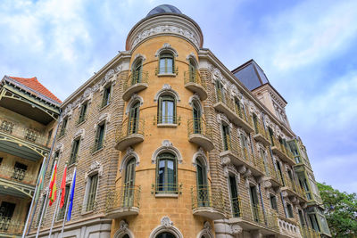 Low angle view of historic building against sky