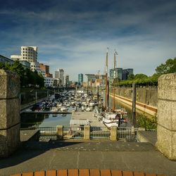 High angle view of buildings in city against sky