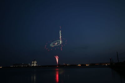 Firework display at night