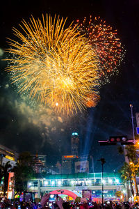 Firework display at night