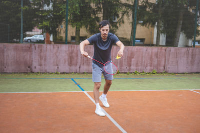 Portrait of young man playing soccer