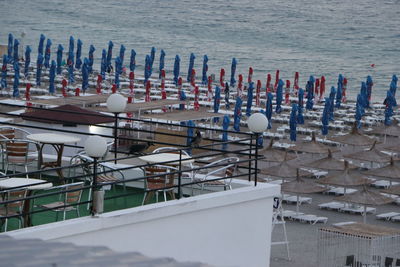 High angle view of buildings by sea