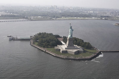 High angle view of statue of liberty with waterfront