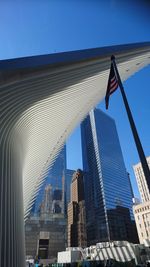 Low angle view of modern skyscraper against clear sky
