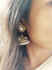 Close-up of woman wearing earring