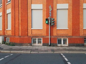 Cropped road against built structure