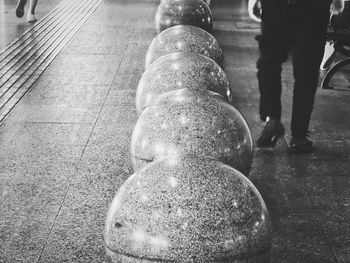 Low section of people walking on footpath