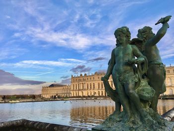 Low angle view of statue against sky in versailles back in 2019