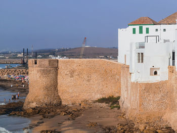 Aerial view over the old medina of asilah with the coast in morocco