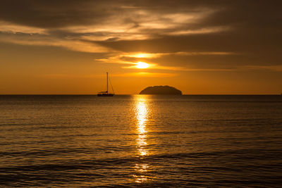 Scenic view of sea against sky during sunset