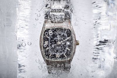 Wristwatch in ice block