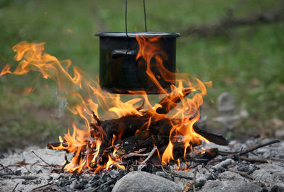 Close-up of bonfire on field