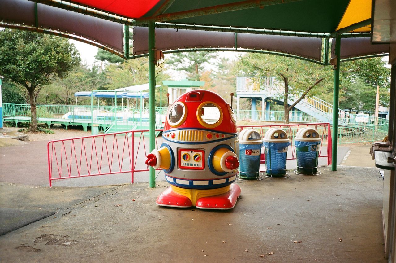 architecture, day, no people, tree, built structure, plant, absence, outdoors, security, nature, red, safety, protection, arts culture and entertainment, amusement park, park, amusement park ride, barrier, outdoor play equipment