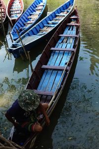 High angle view of people in boat on lake