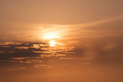 Low angle view of dramatic sky during sunset