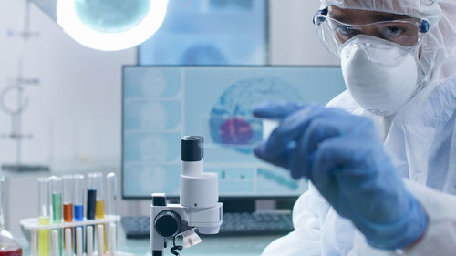 Close-up of scientist working in laboratory