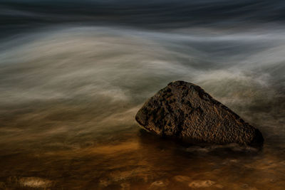 High angle view of rock formation in sea