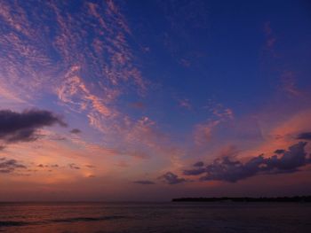 Scenic view of sea against sky at sunset