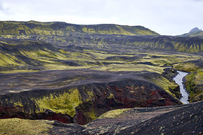 Scenic view of volcanic landscape against sky