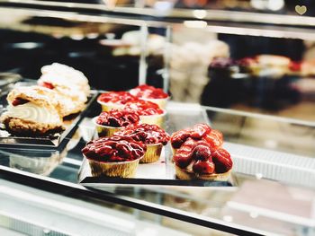 High angle view of tarts in tray on display cabinet in store