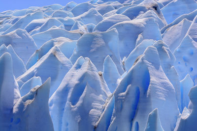 Full frame shot of snow covered rock formations